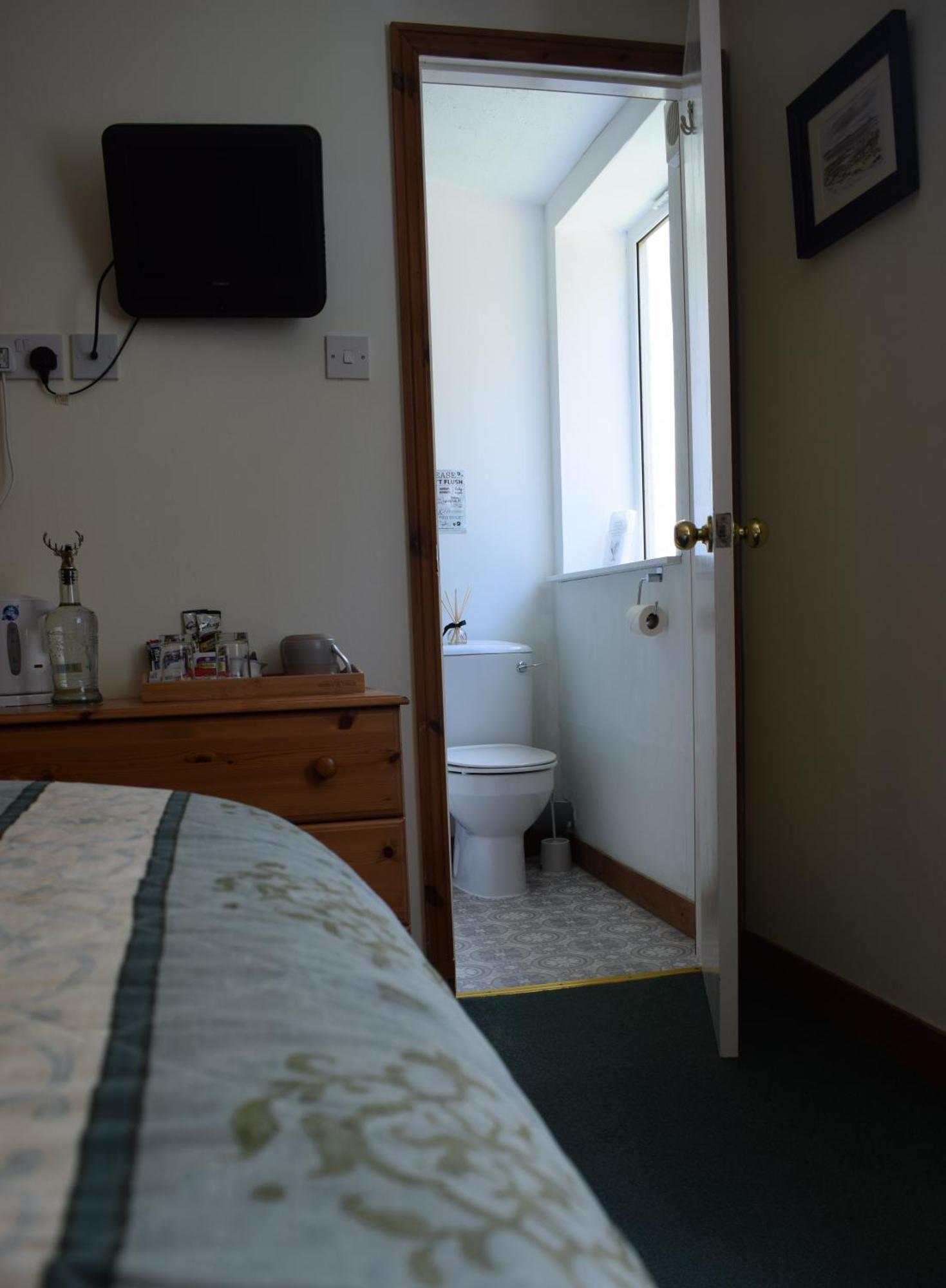 Glenan Lodge Self Catering Tomatin Buitenkant foto