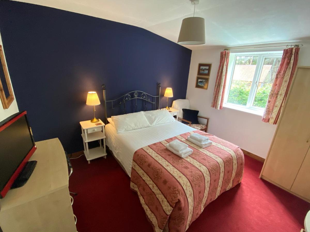 Glenan Lodge Self Catering Tomatin Buitenkant foto